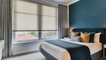 Bedroom with a roller blind showing the different types of roller blinds